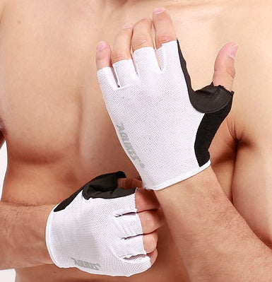 White fitness gloves with black accents held by a person