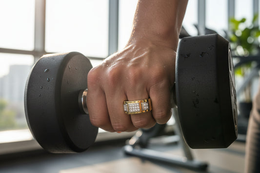 Gold ring with diamond accents on a man working with weights