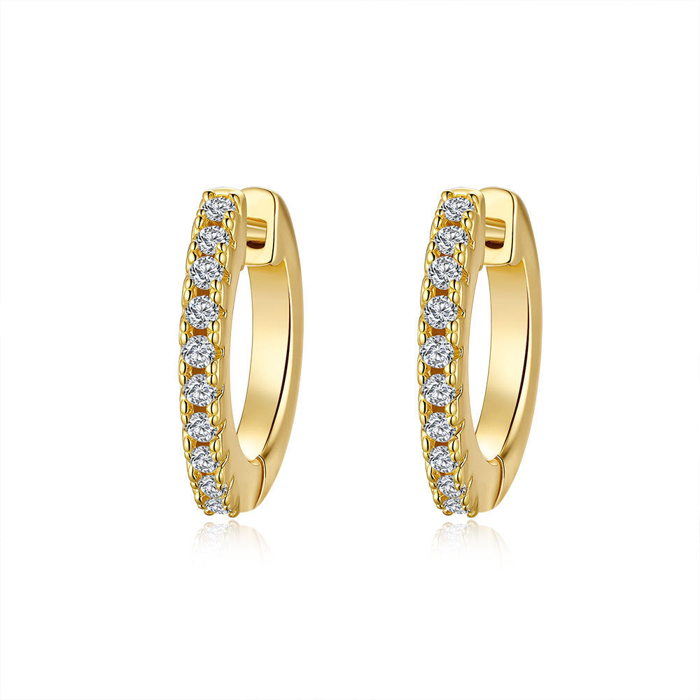 Gold hoop earrings with diamond accents on a white background