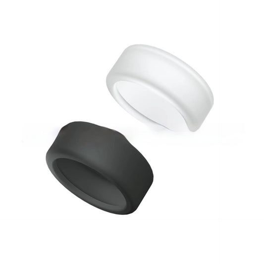Black and white silicone rings on a white background