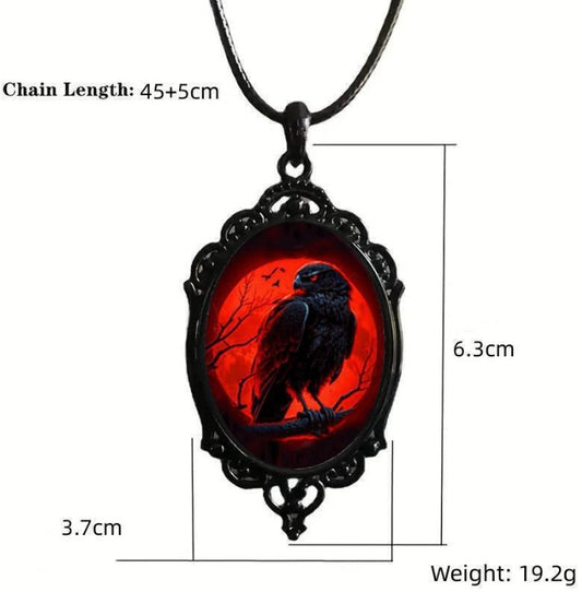 Necklace with a red pendant featuring a black bird, shown with measurements on a white background.