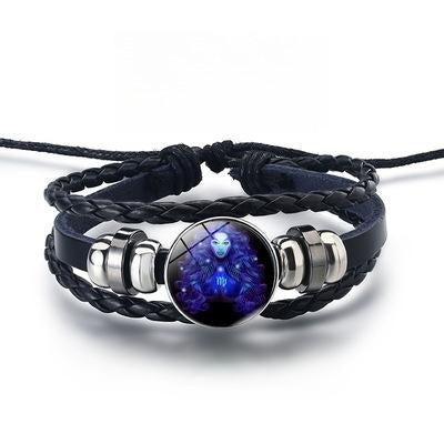 Bracelet with blue stone and silver accents on a white background