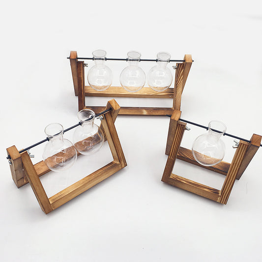 Wooden rack with glass bulbs on a white background