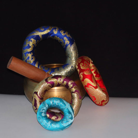 Decorative rings with colorful patterns on a black background