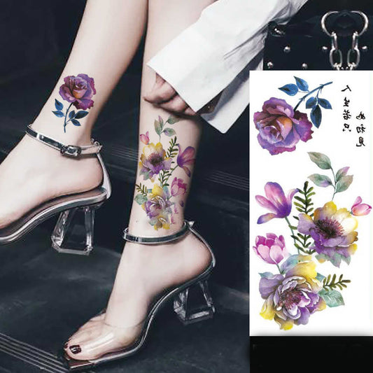 Floral tattoo designs on a person's leg with matching tattoos in the corner.