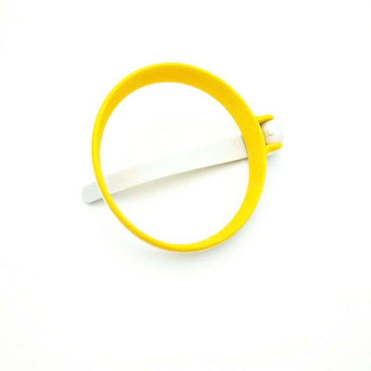 Yellow circular object on a white background