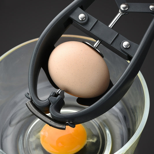 Egg separator with two eggs inside on a dark background