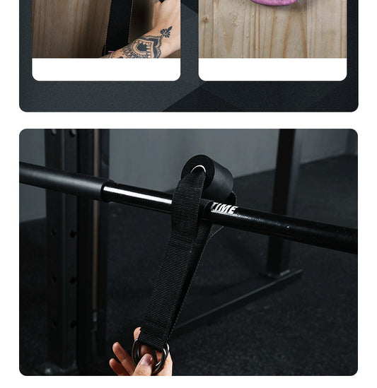 Black pull-up bar with a strap attached, held by a hand on a dark background.