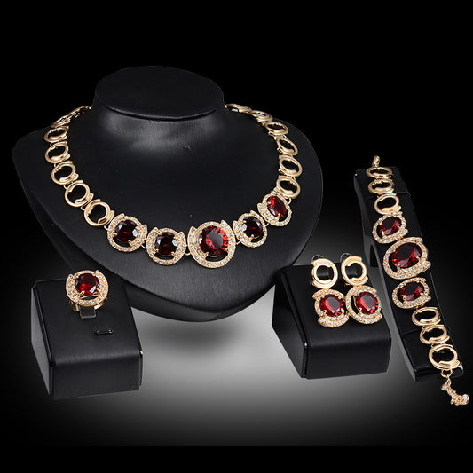Jewelry set with necklace, earrings, and bracelet on a black background