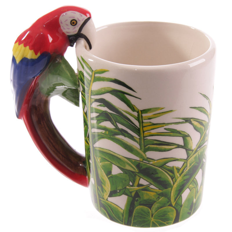 Mug with parrot handle and tropical leaf design