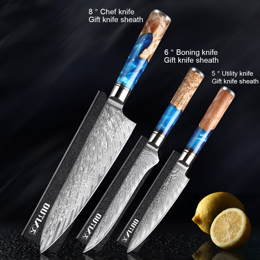 Set of three knives with blue handles and wooden sheaths on a dark background.