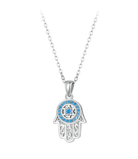Silver Hamsa hand necklace with blue stones on a white background