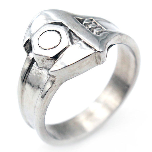 Silver ring with geometric design on a white background