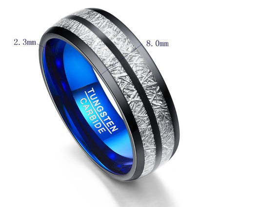 Tungsten carbide ring with blue interior and textured exterior on a white background