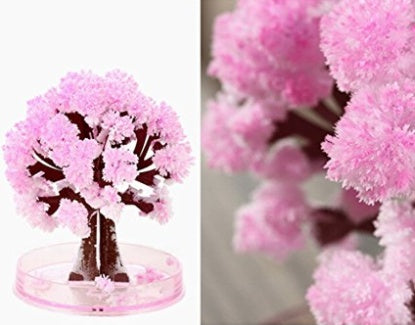 Pink decorative tree and flowers on a white background