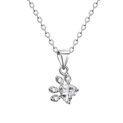 Silver necklace with a heart-shaped pendant on a white background