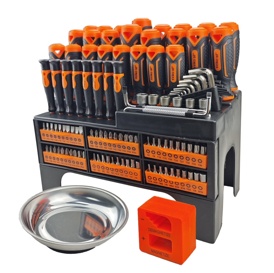 Set of tools including screwdrivers, bits, and a tray on a white background