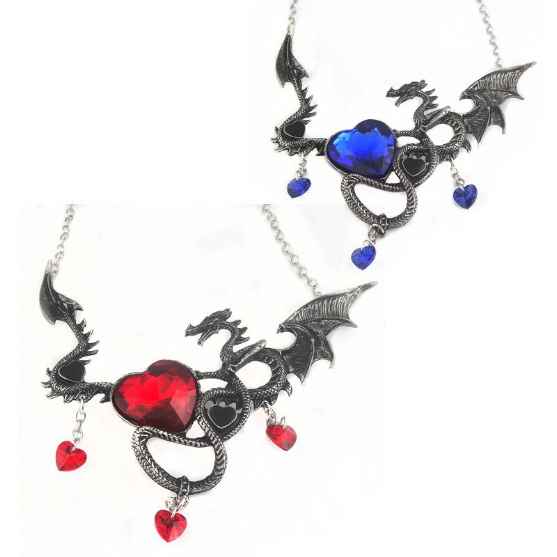 Gothic-style necklace with dragon design and heart-shaped gemstones on a white background
