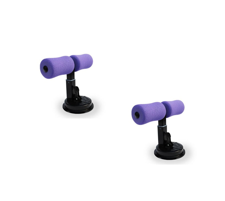 Pair of purple sit up exercisers with suction cups on a white background