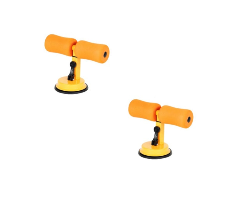 Two yellow sit up exercise devices on a white background