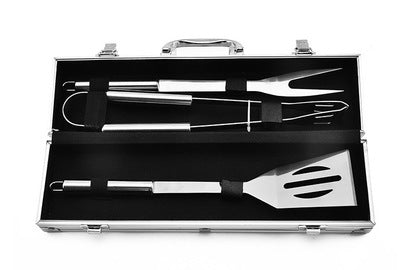 Set of barbecue tools in a black case on a white background