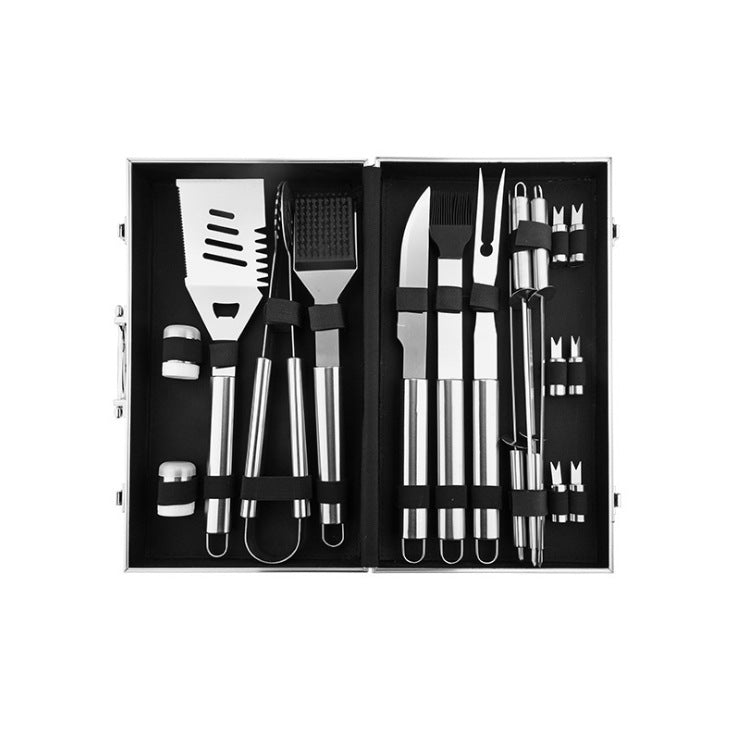 Set of barbecue tools in a black case on a white background