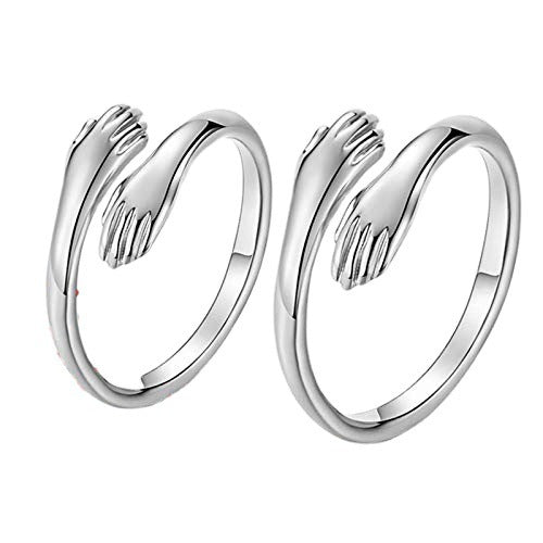 Pair of silver hoop earrings on a white background