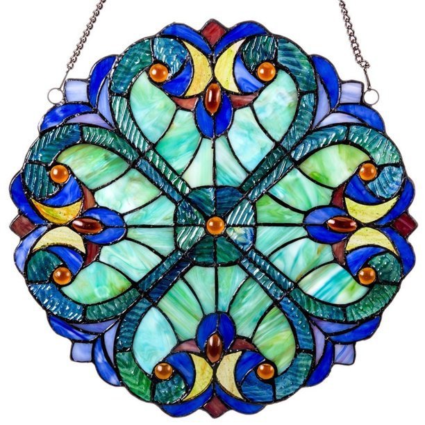 Stained glass heart-shaped decorative panel with blue, green, and red colors on a white background