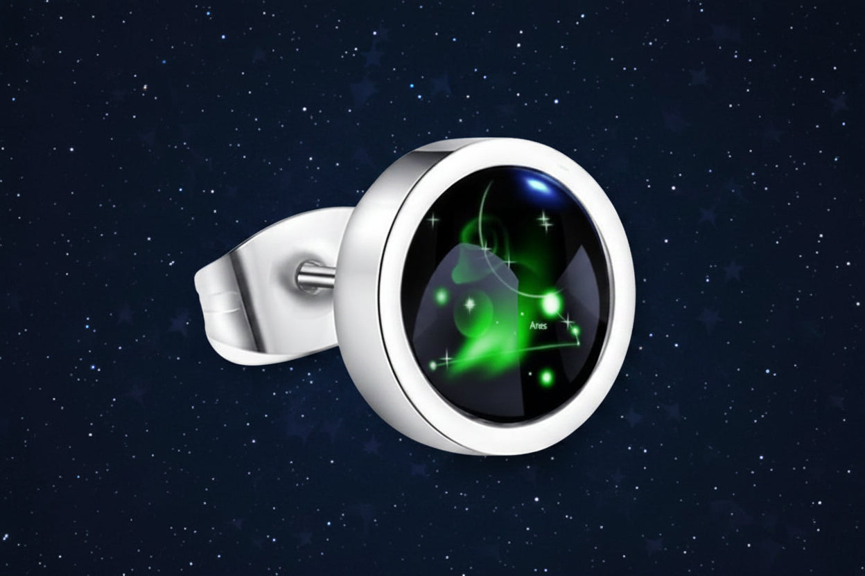 Silver ring with a green celestial design on a white background from nested wisdom