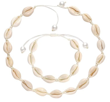 Shell necklace with pearls on a white background