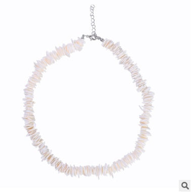 Necklace with shell beads on a white background