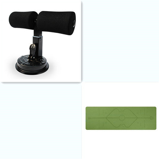 Black suction cup sit up device and green mat on a white background