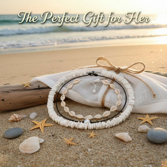 Necklace with shell beads and a pearl on a white background