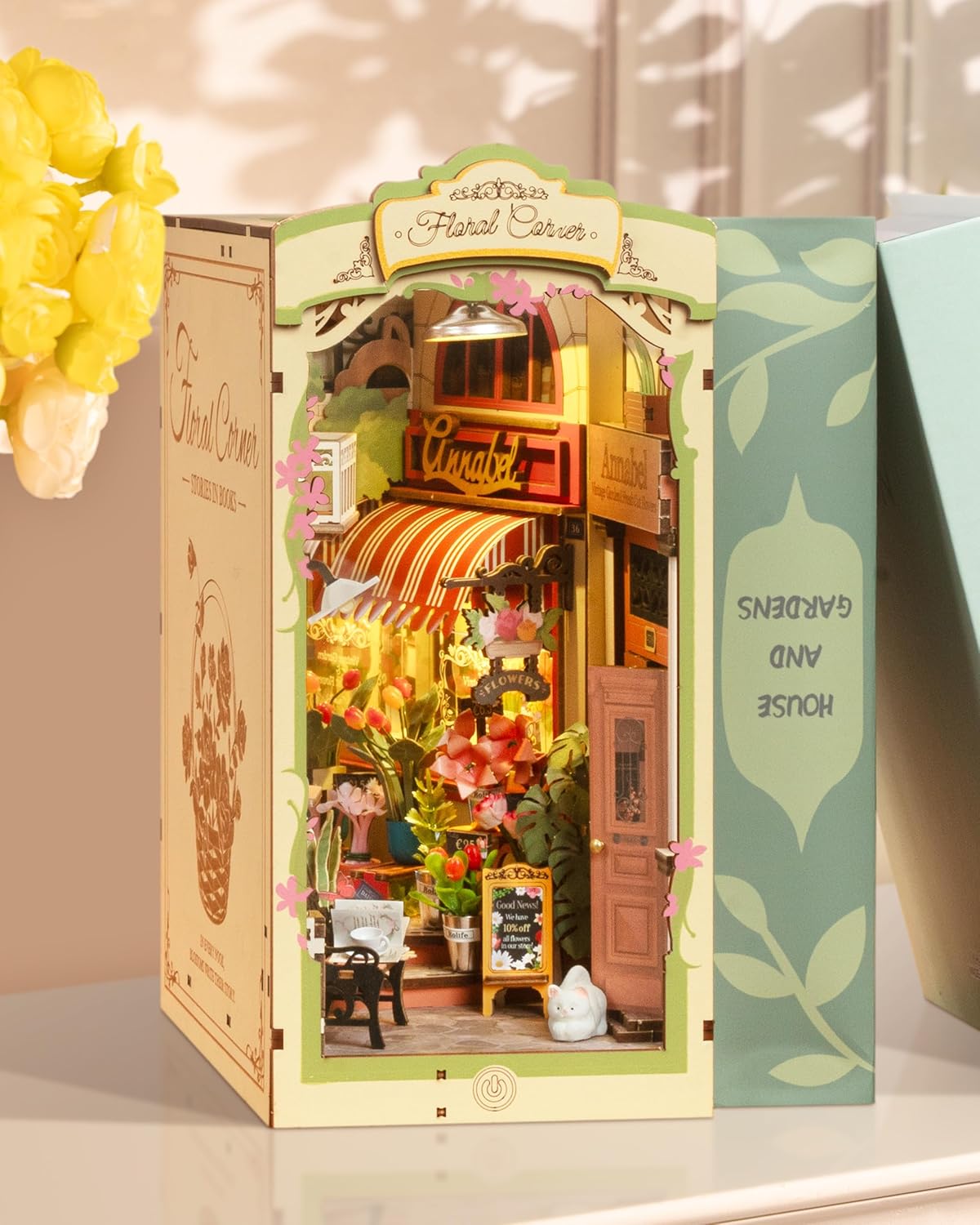 Detailed model of a flower shop in a box with decorative elements.