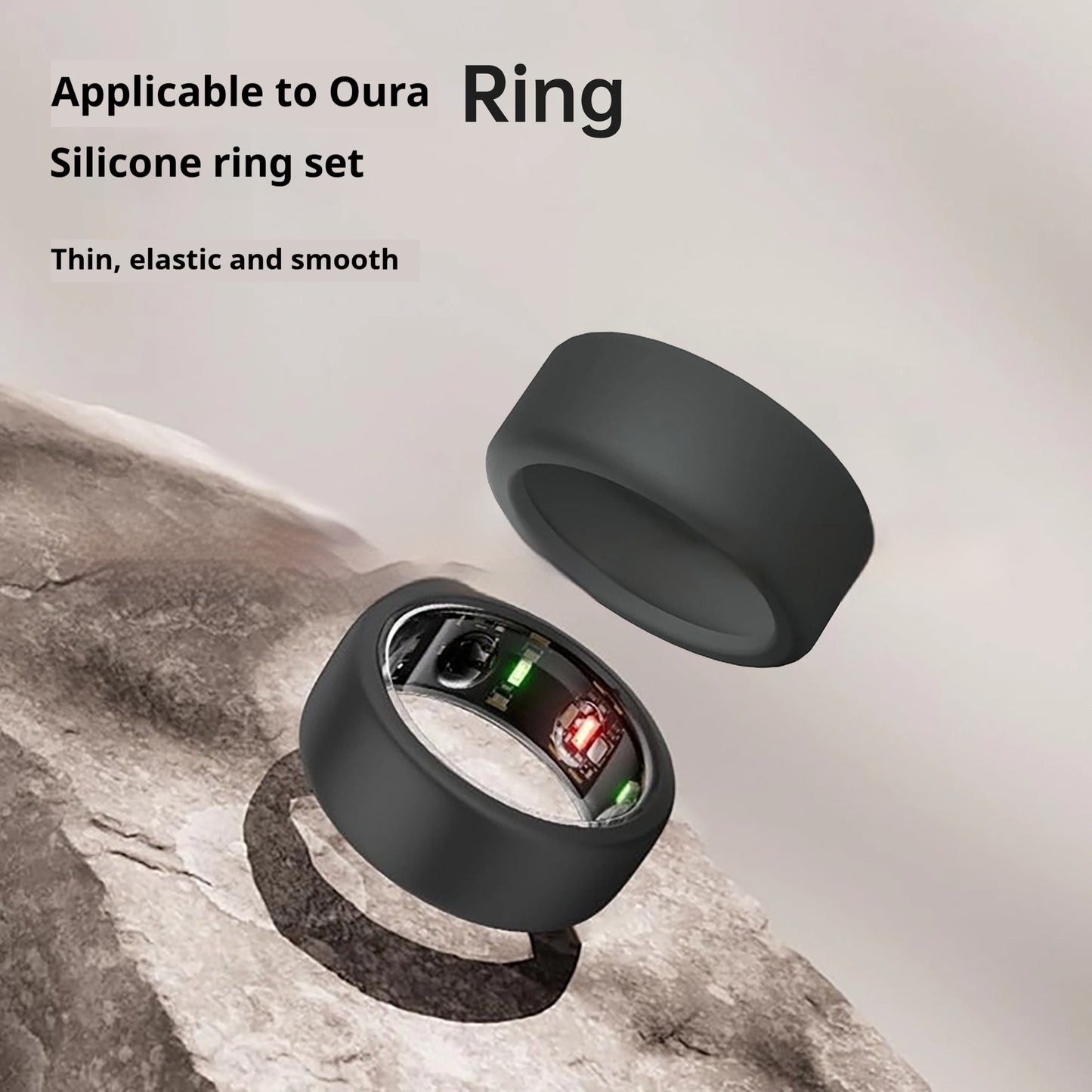 Black silicone ring set on a stone surface with text about compatibility and features.