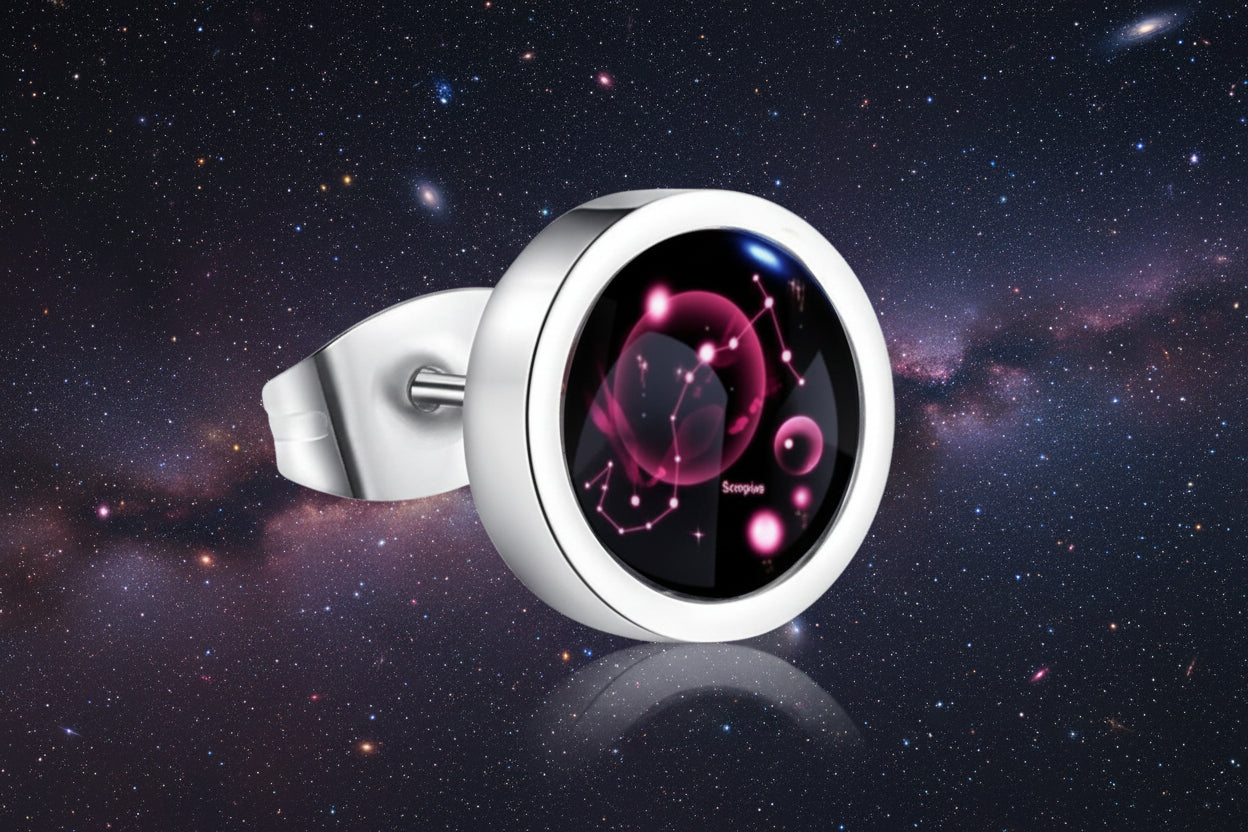 Silver ring with a black gemstone featuring astrological design on a white background from nested wisdom