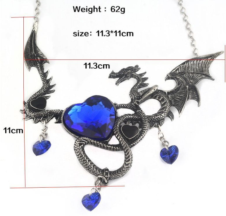Dragon-shaped necklace with blue heart pendants and measurements on a white background