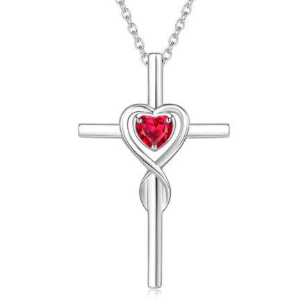 Birthstone  Silver cross necklace with a red heart pendant on a white background
