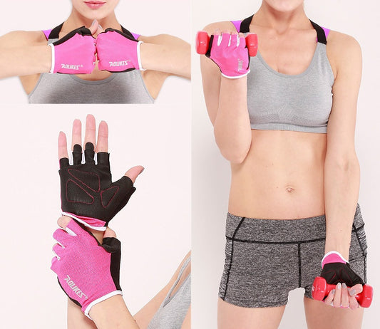 Person wearing pink and black workout gloves with a focus on fitness gear.