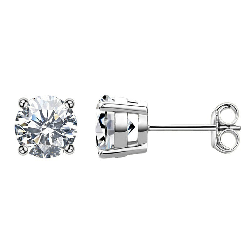 Pair of silver stud earrings with clear gemstones on a white background