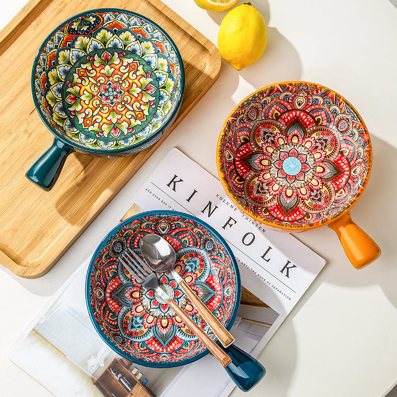 Colorful ceramic dishes with intricate patterns on a magazine with 'KINFOLK' branding. From Nested Wisdom