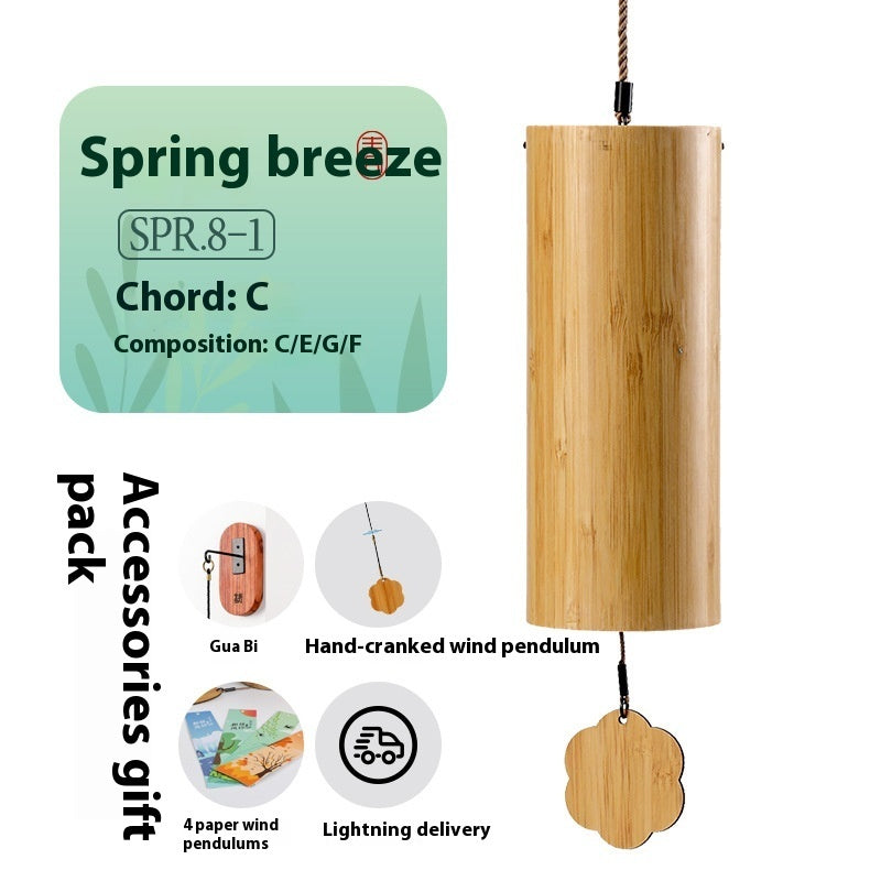 Wooden wind chime with 'Spring Breeze' label and product details on a white background