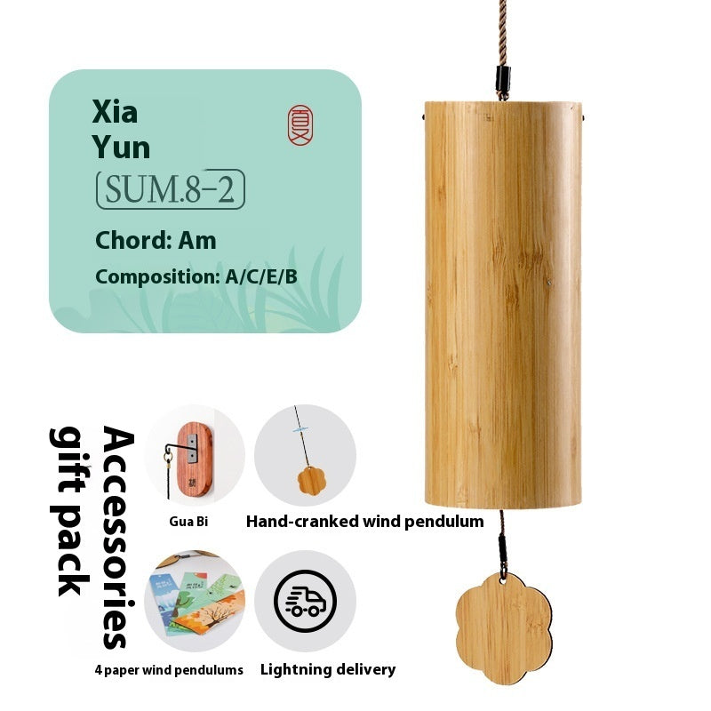 Wooden wind chime with packaging labeled 'Xia Yun' on a white background