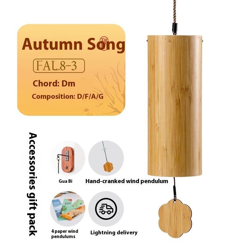 Wooden wind chime with label 'Autumn Song' and additional accessories on a white background