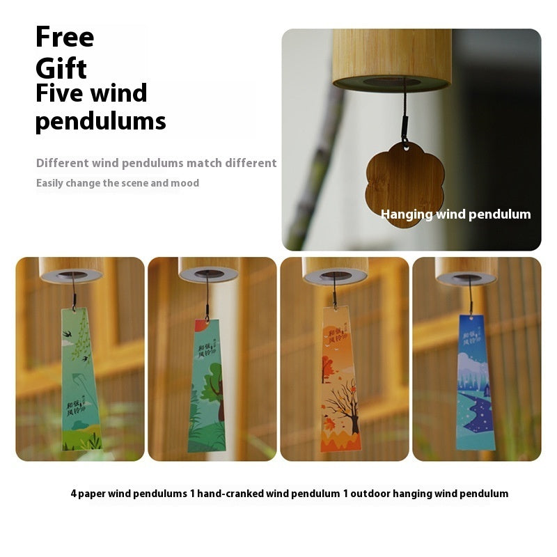 Promotional image of hanging wind pendulums with text about free gift offer.