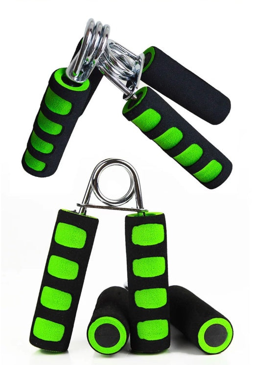 Pair of black and green hand grip exercisers on a white background