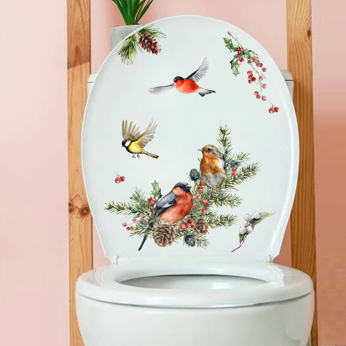 Toilet seat cover with bird and floral design on a wooden background