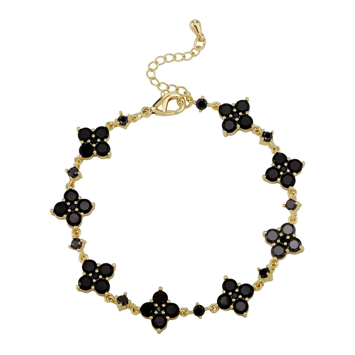 Gold bracelet with black floral stones on a white background