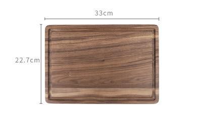Wooden cutting board with dimensions labeled on a white background