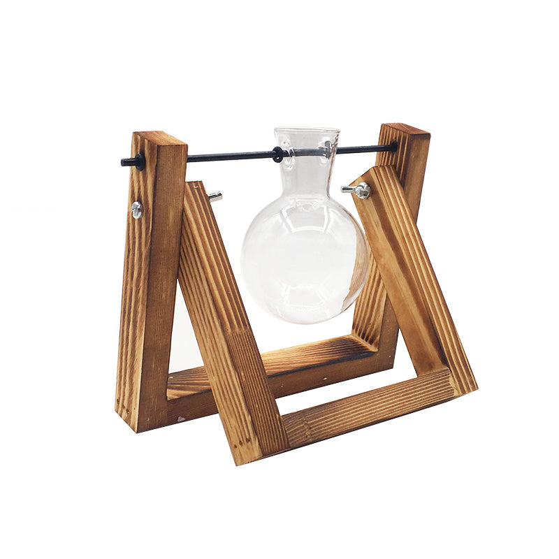 Wooden frame with a glass vase on a white background